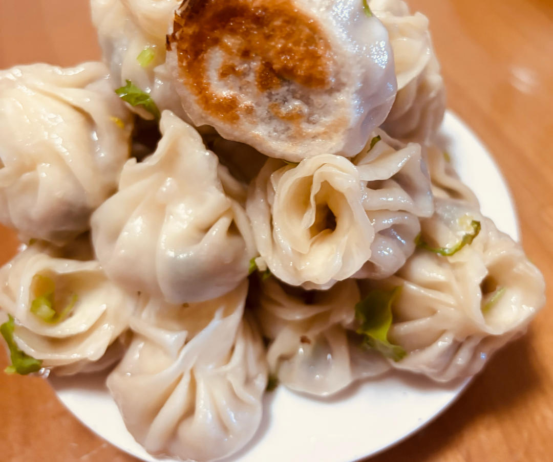 饺子皮包猪精肉