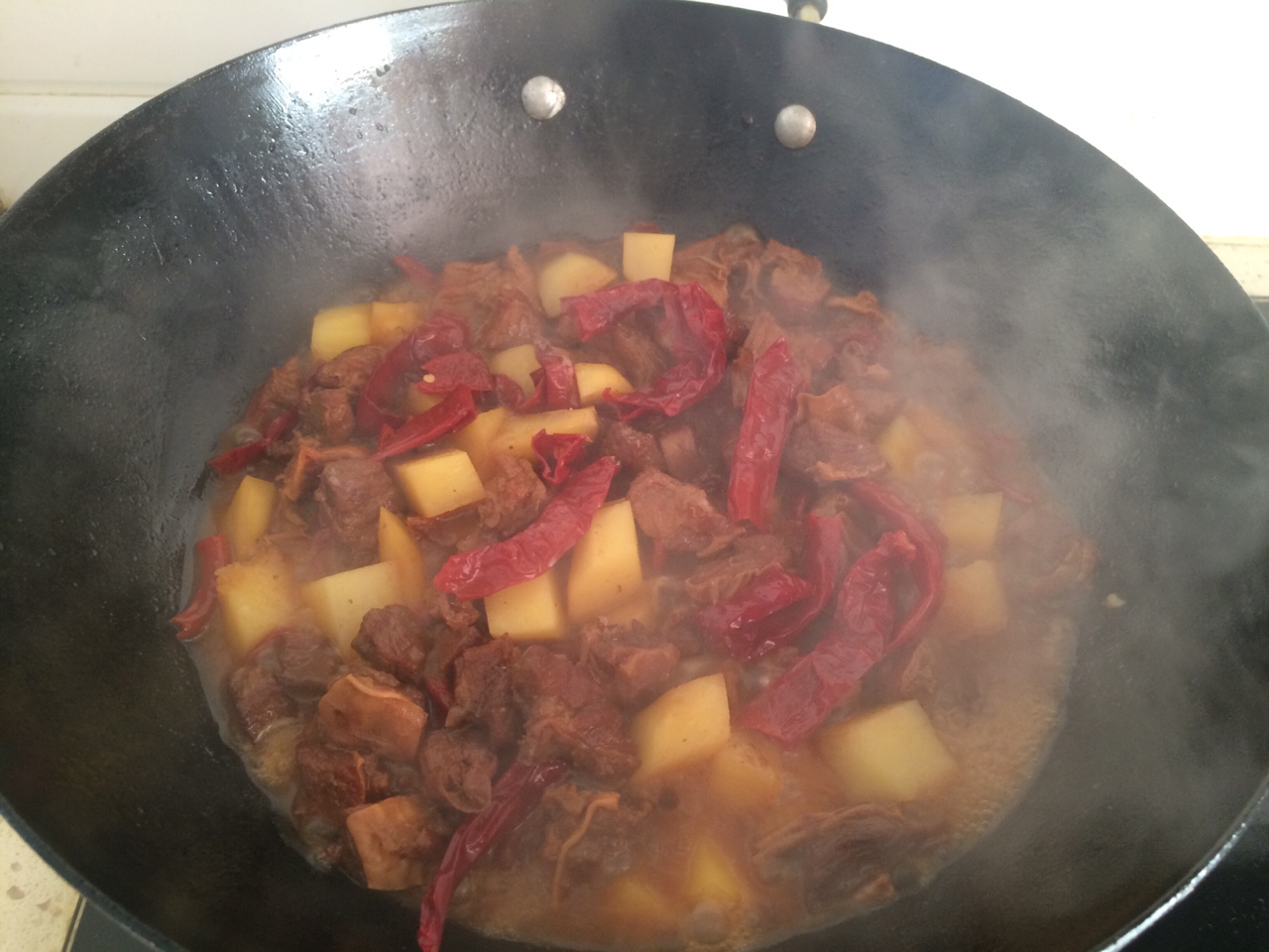 新疆风味的土豆烧牛肉的做法 步骤12