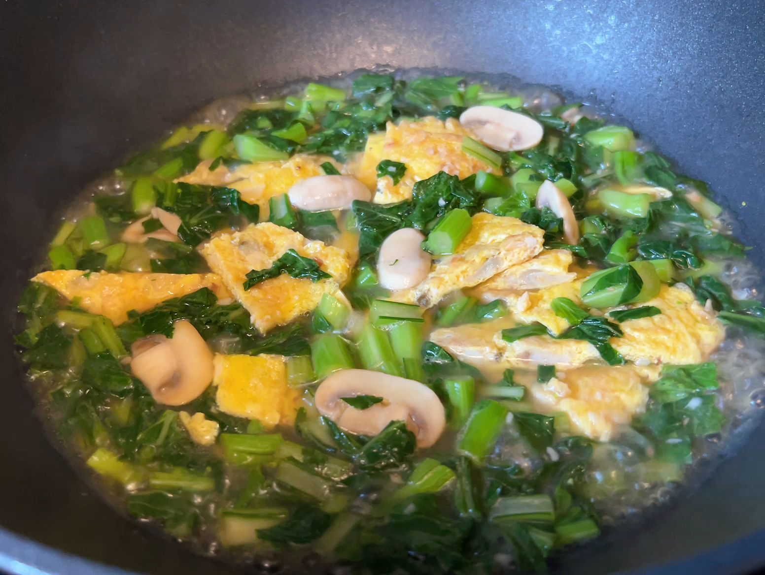 蛤蜊抱蛋与蘑菇菜心的做法 步骤17
