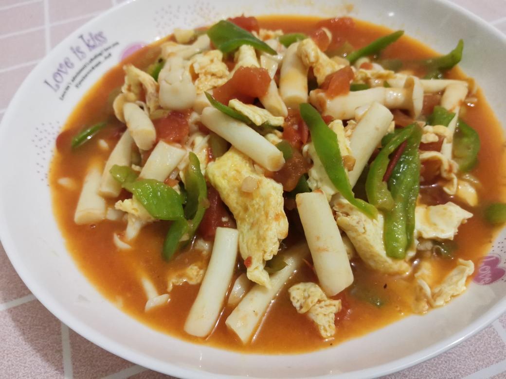 西红柿炒海鲜菇的做法