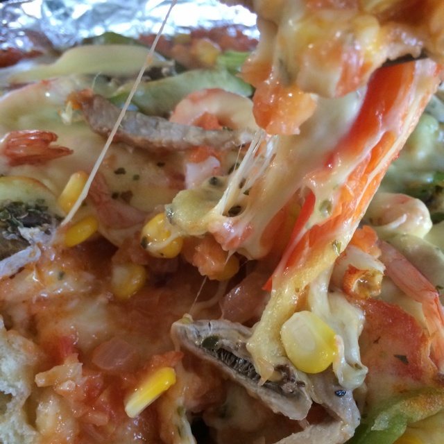 【鲜虾仁培根披萨】