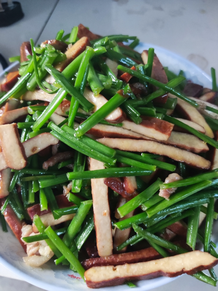 豆干炒韭菜苔的做法