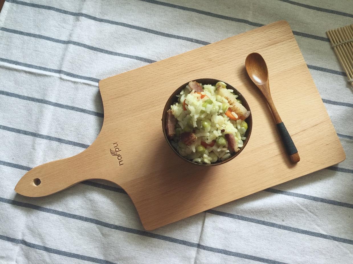 腊肉豌豆焖干饭的做法