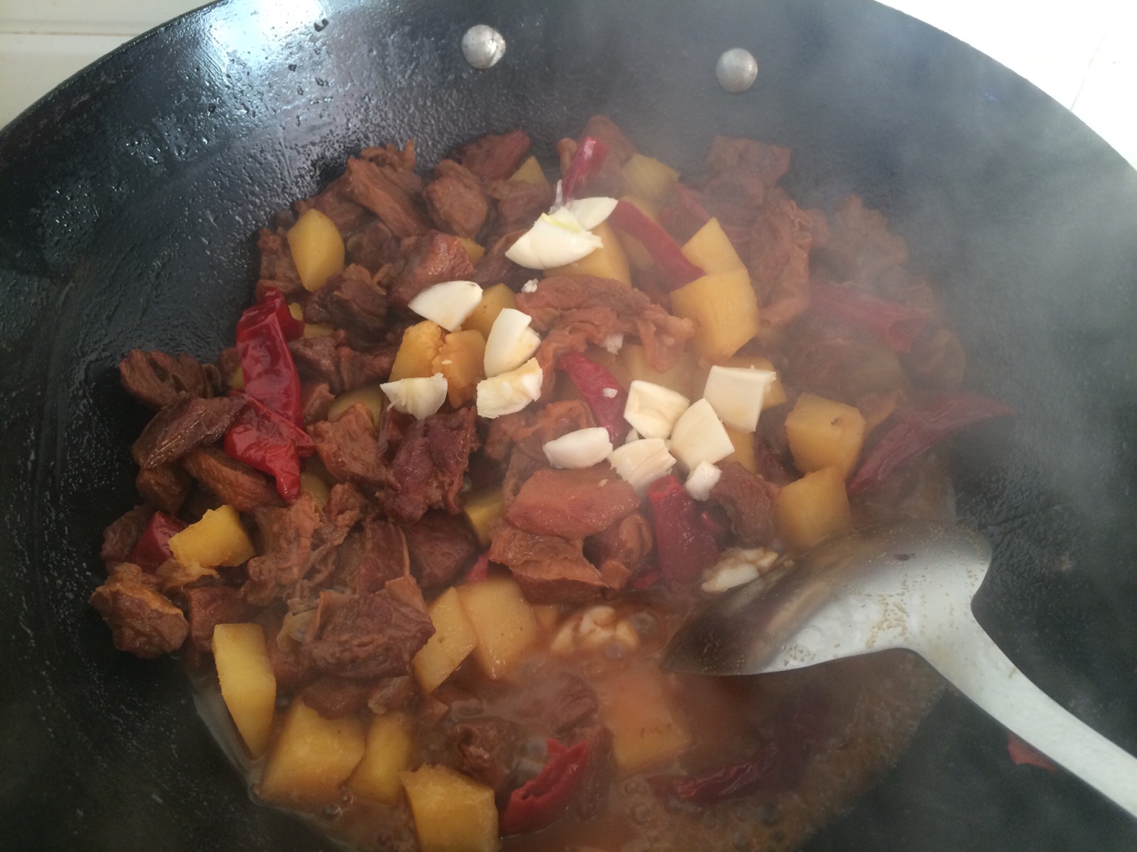 新疆风味的土豆烧牛肉的做法 步骤14
