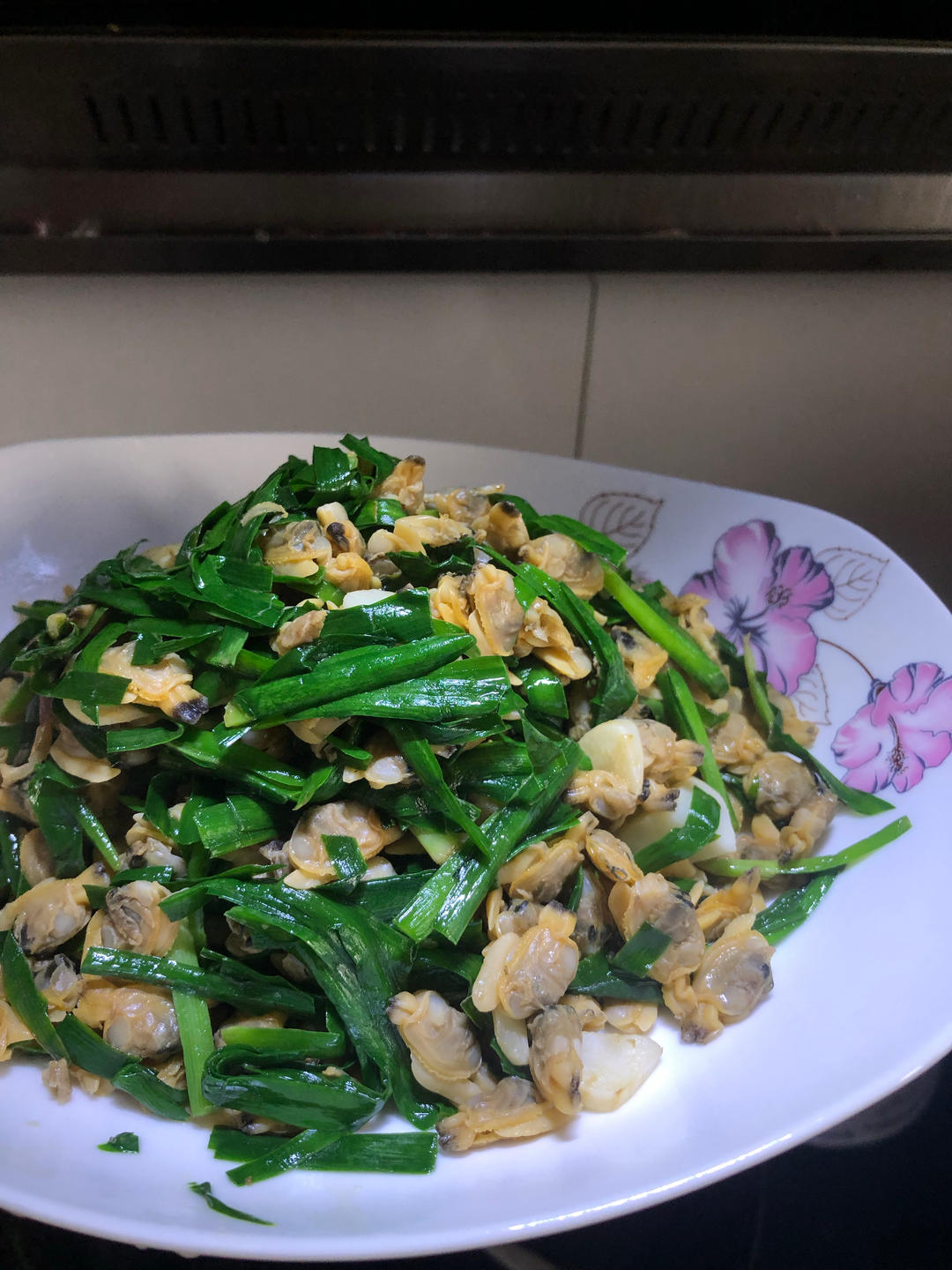 今日菜谱：蛤蜊肉炒韭菜