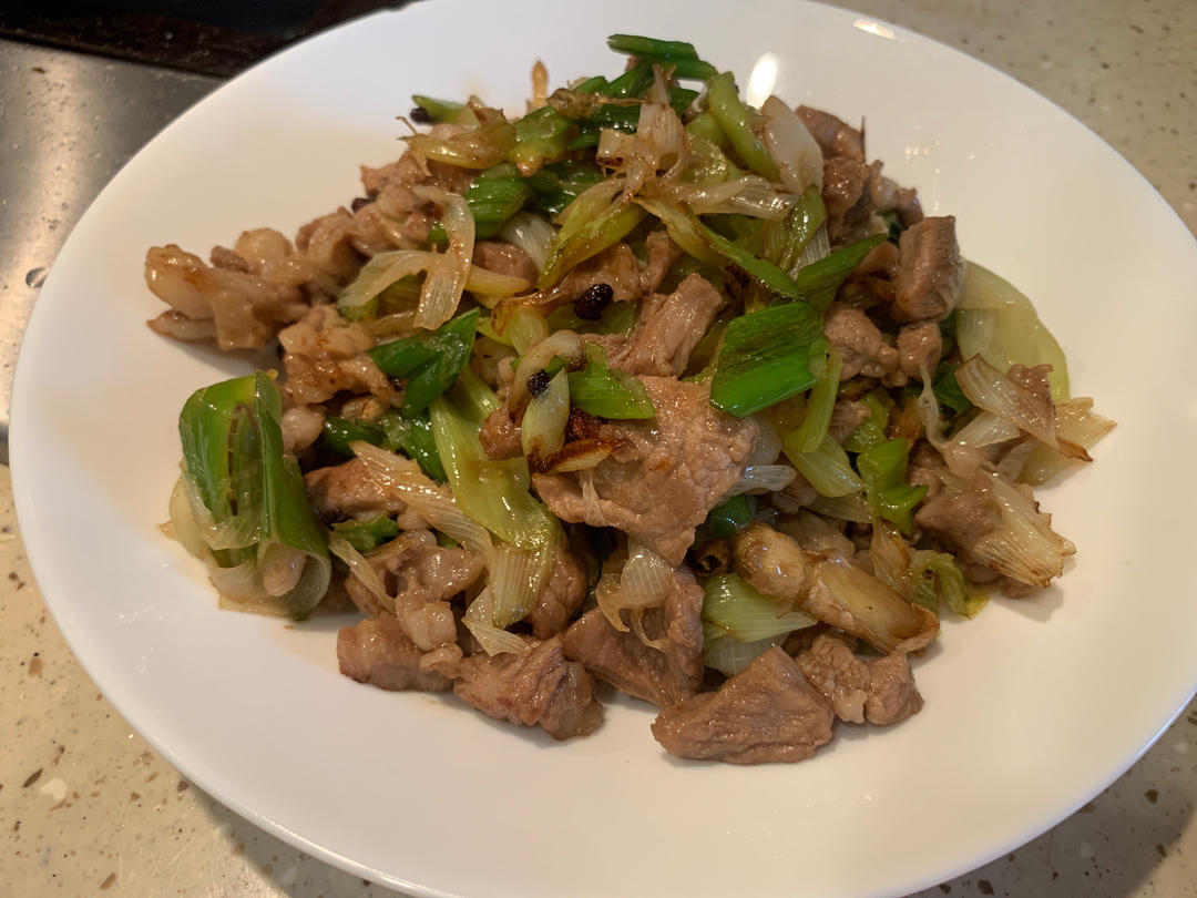 炒了20多年的葱爆羊肉