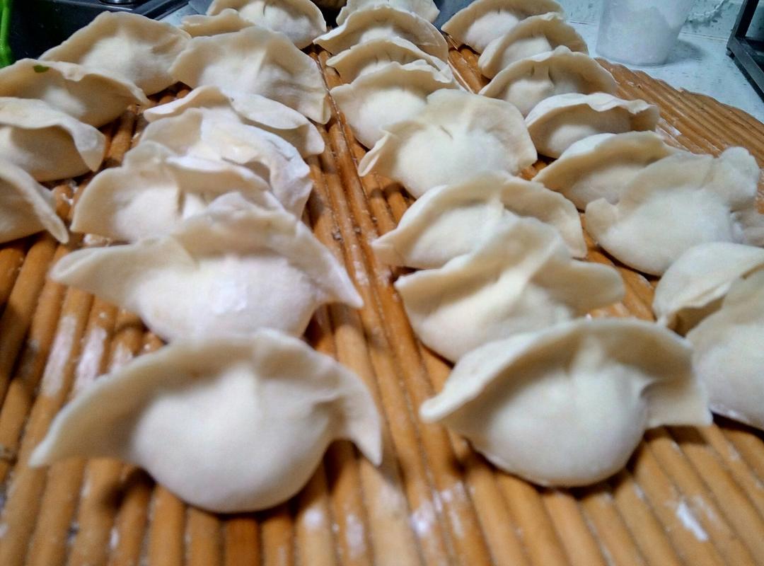 普通大肚饺子包法（内有羞答答小视频ヾ(@^▽^@)ノ　）