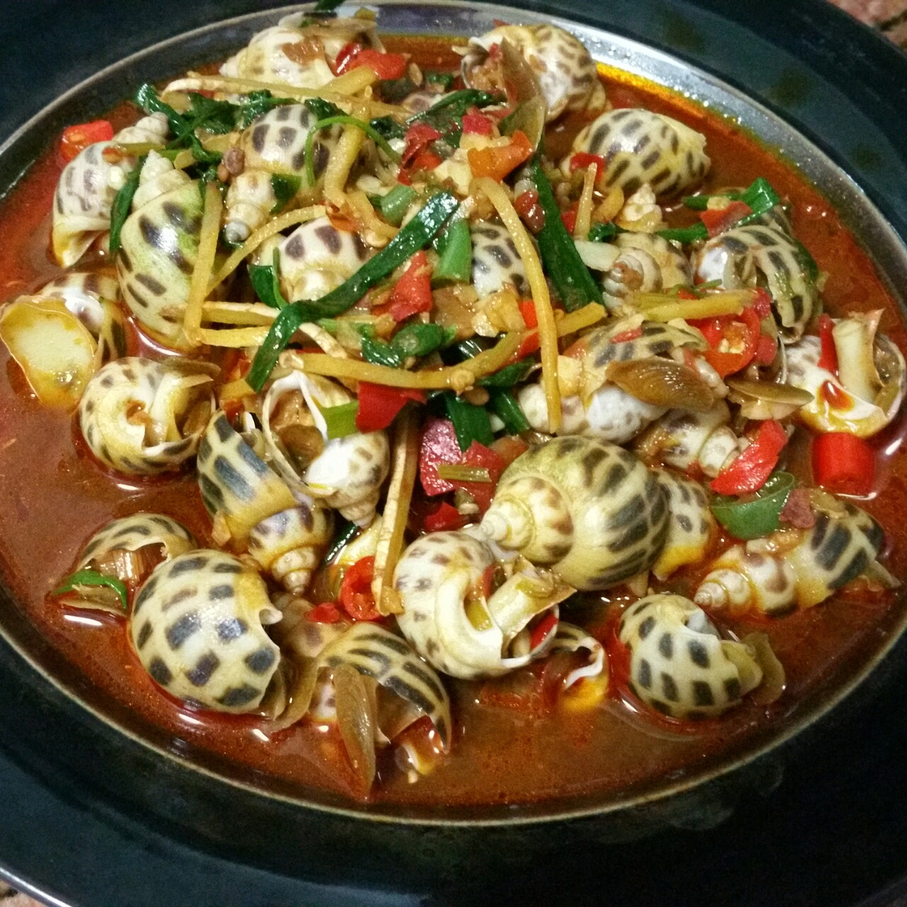 黑粉君做的辣酒煮花螺