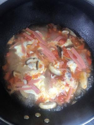 番茄鸡蛋蘑菇汤的做法 步骤6