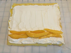 芒果蛋糕卷的做法 步骤13