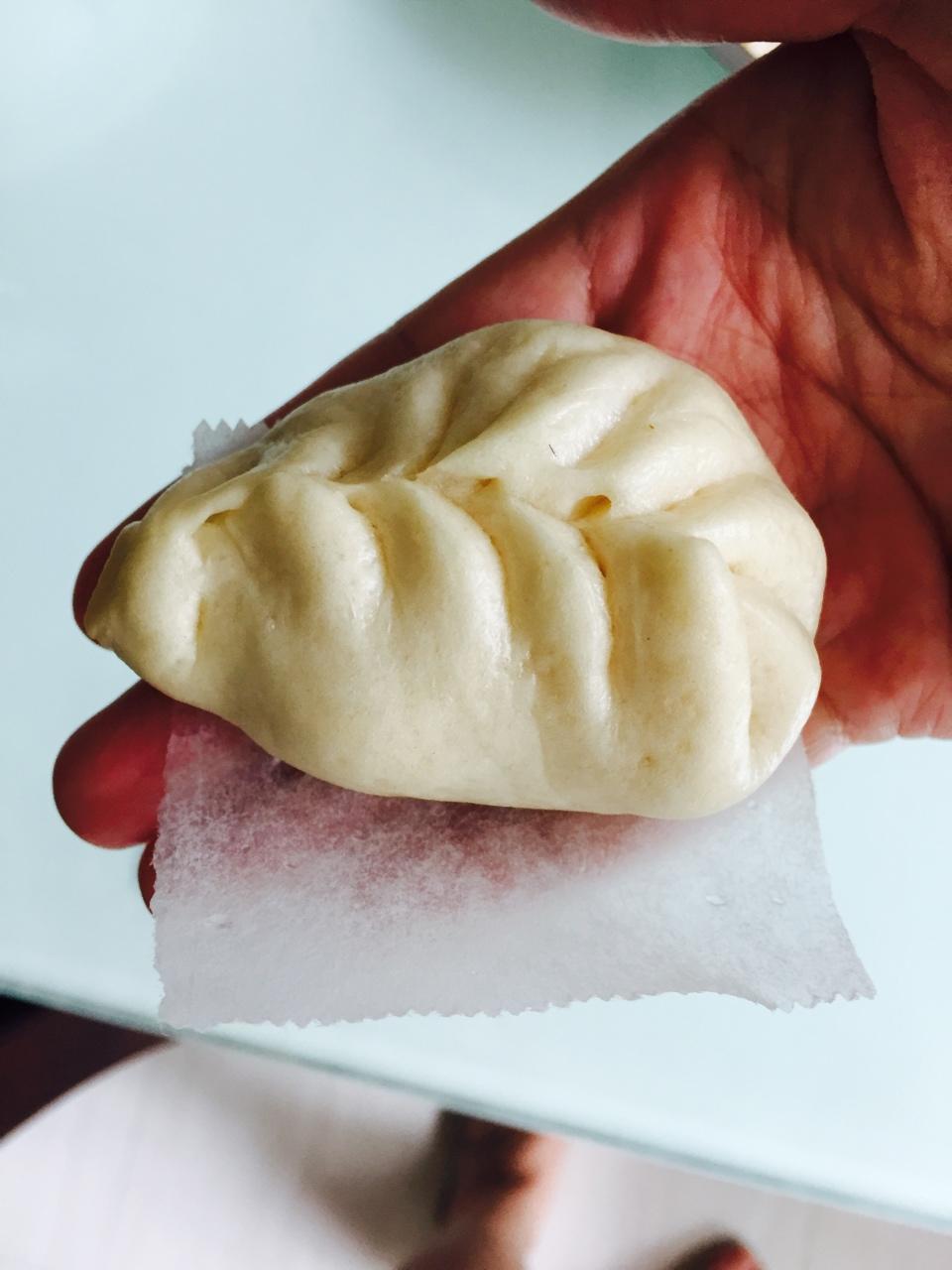 弯柳叶包子包法