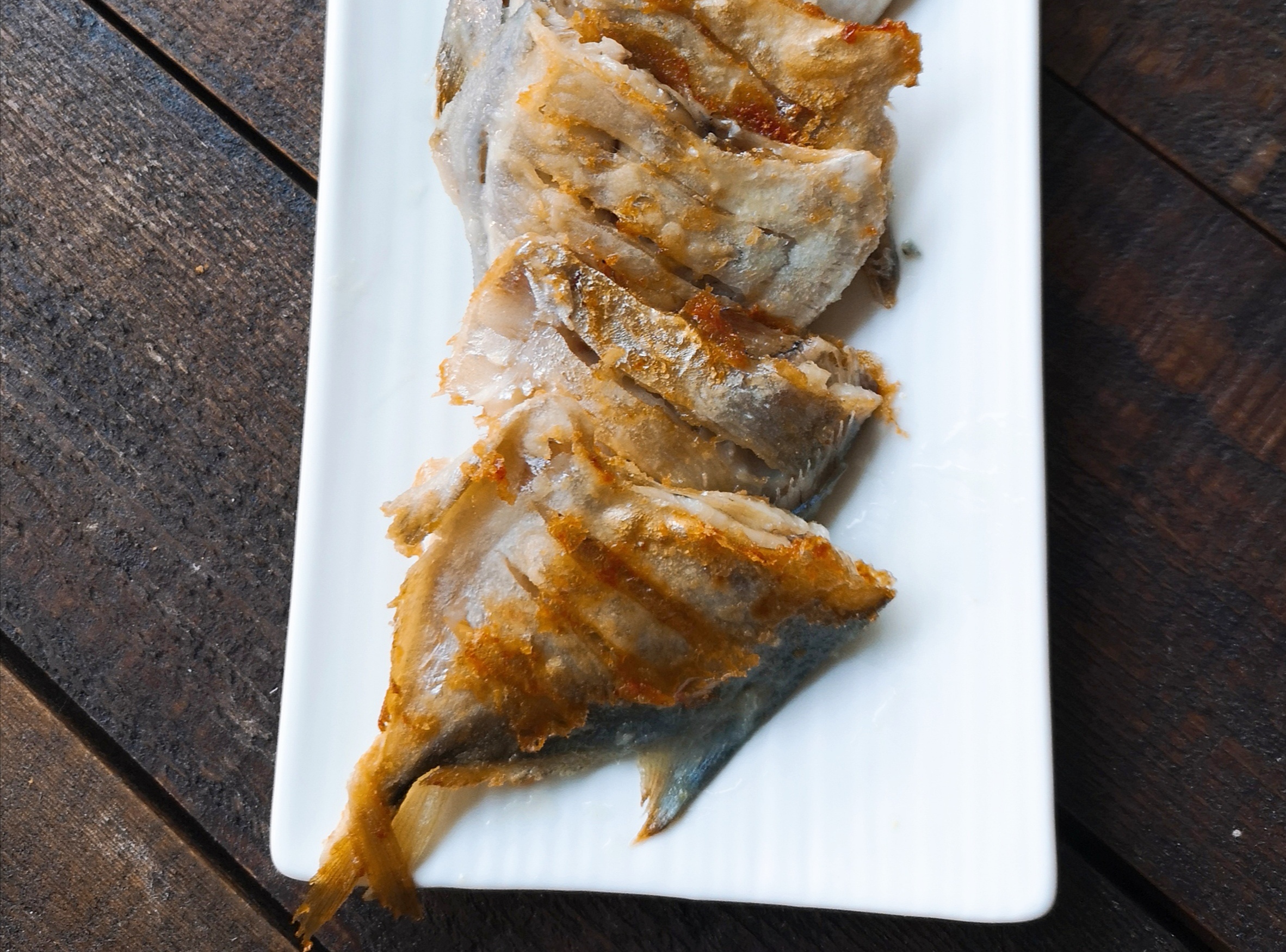 快手香煎小海鱼，这道菜会越吃越聪明的呀！的做法