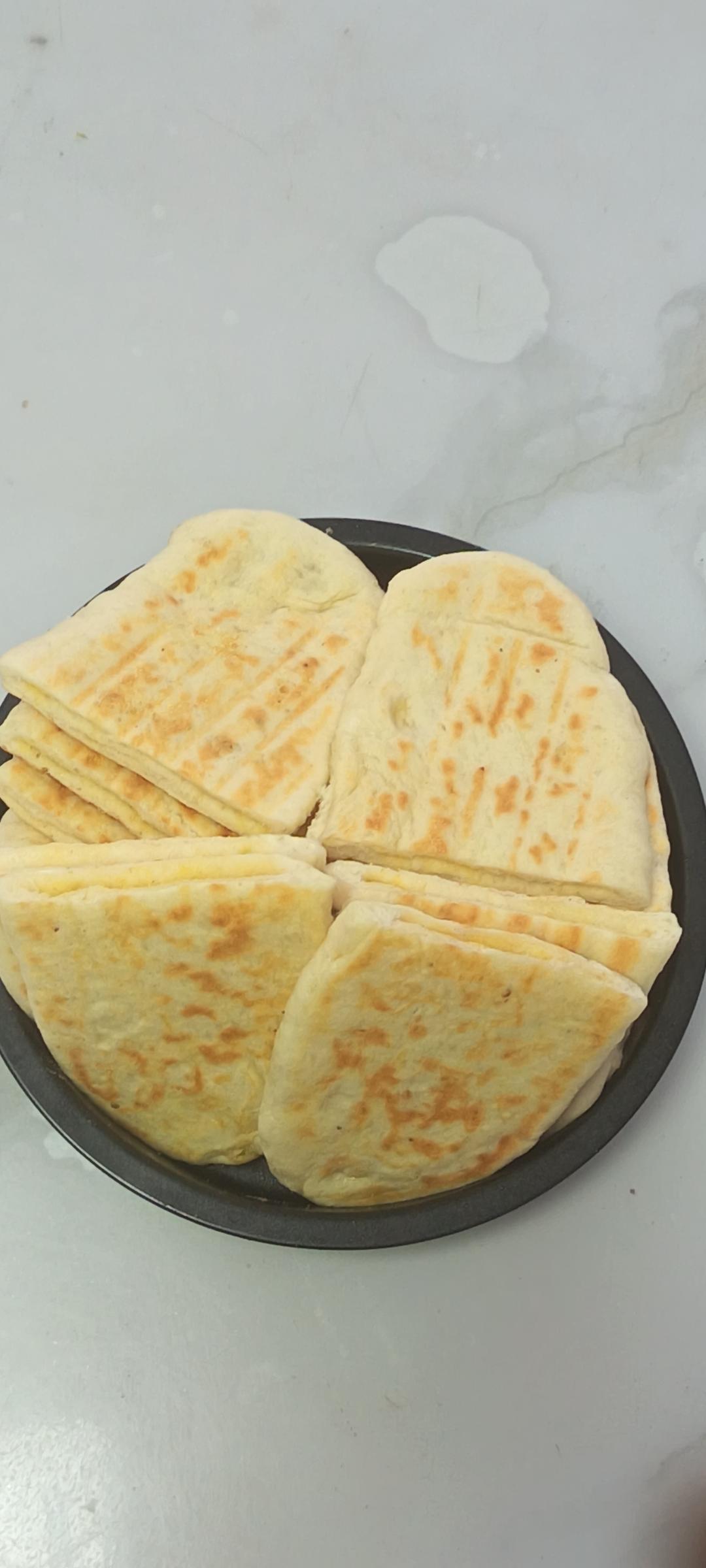 蓬松暄软「发面口袋饼」的做法，万物皆可夹！