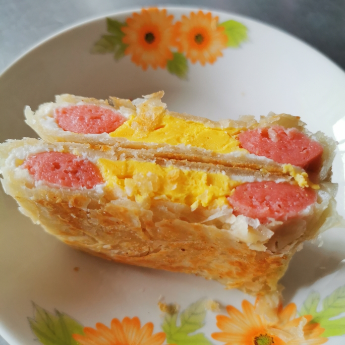 中式三明治🥪只需用手抓饼火腿肠鸡蛋🥚解锁手抓饼新吃法的做法 步骤10
