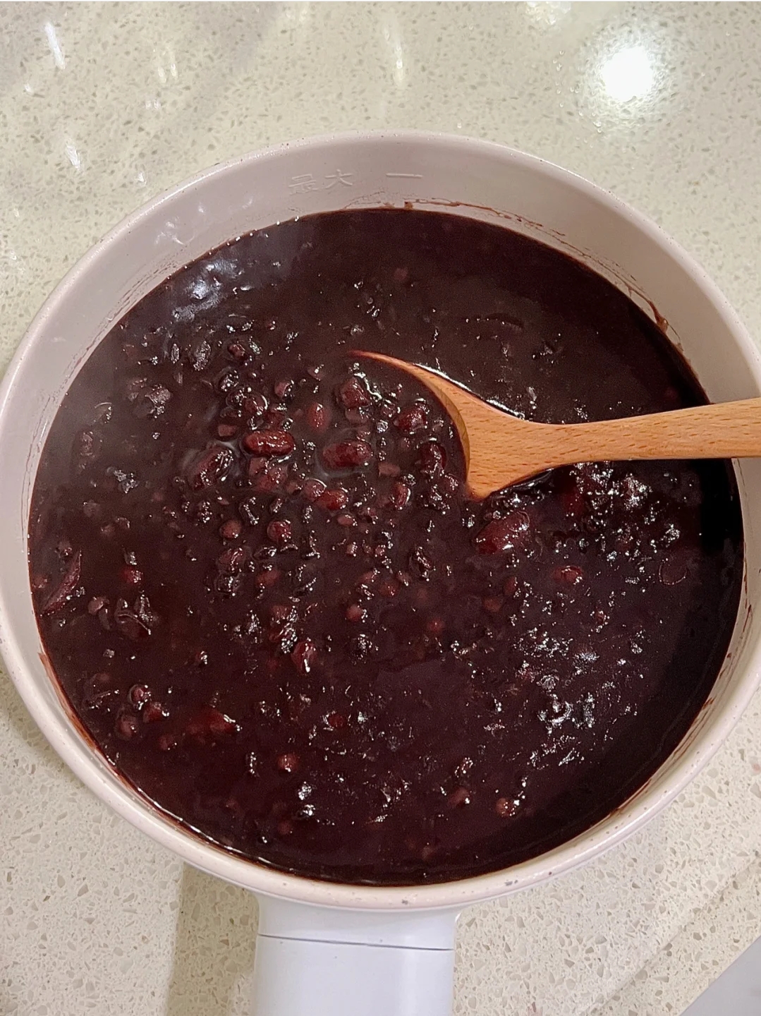 红豆黑米牛奶粥的做法 步骤3