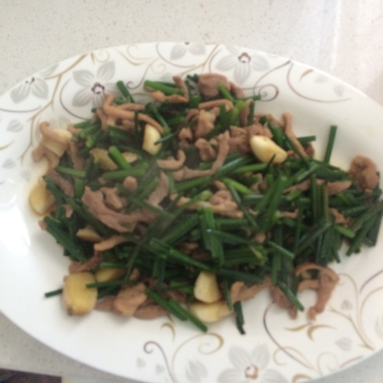 韭菜苔炒肉丝