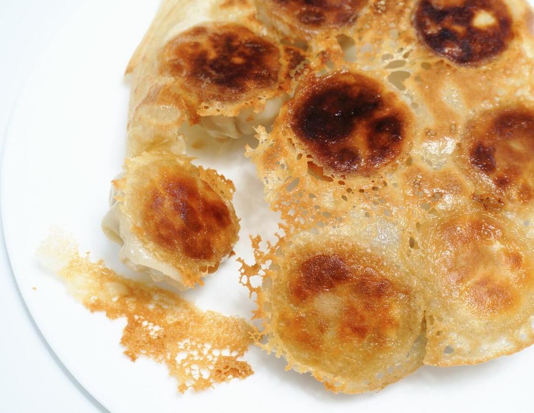 liangunjianpanagahdxcud58yc3b做的三鲜锅贴frieddumplings