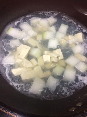 花蛤冬瓜豆腐汤的做法 步骤7