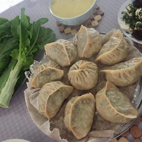 馅大皮薄的小小蒸饺