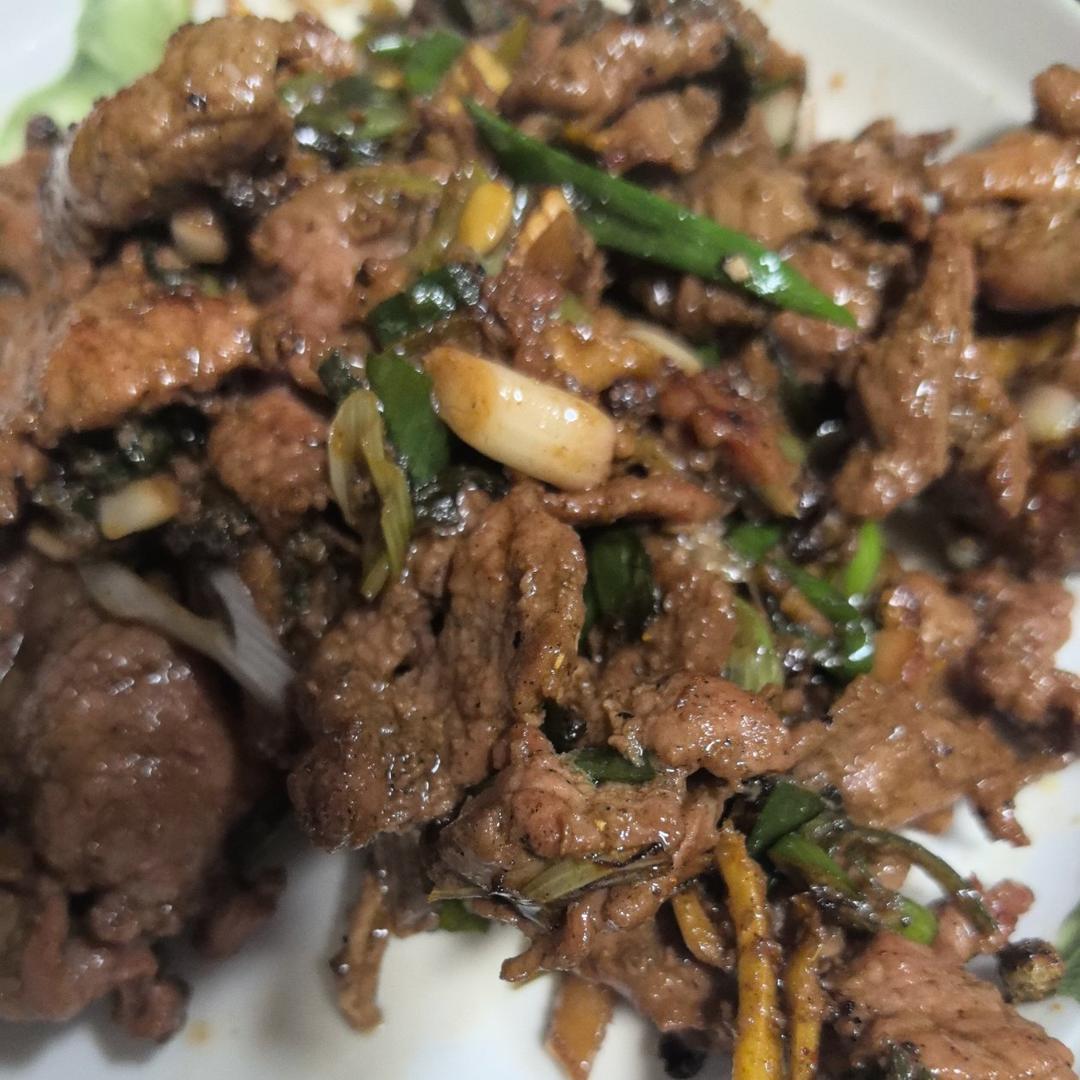 炒了20多年的葱爆羊肉