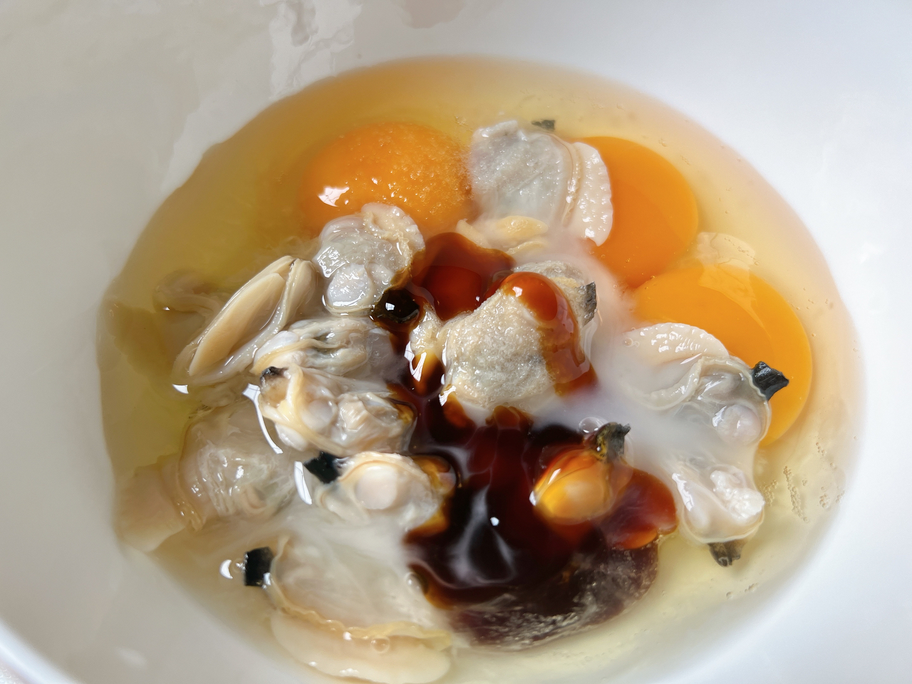 蛤蜊抱蛋与蘑菇菜心的做法 步骤5