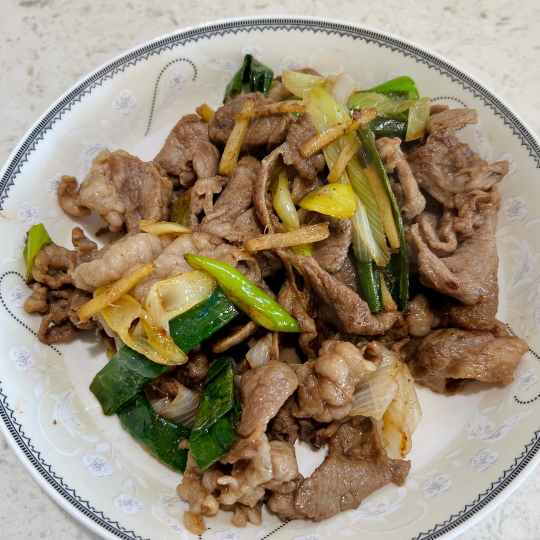 炒了20多年的葱爆羊肉