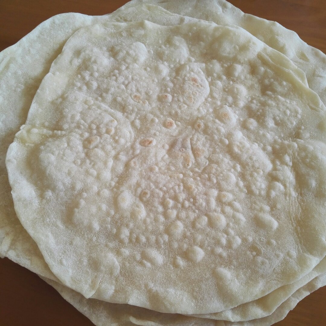 童车姐高兴做的山东单饼