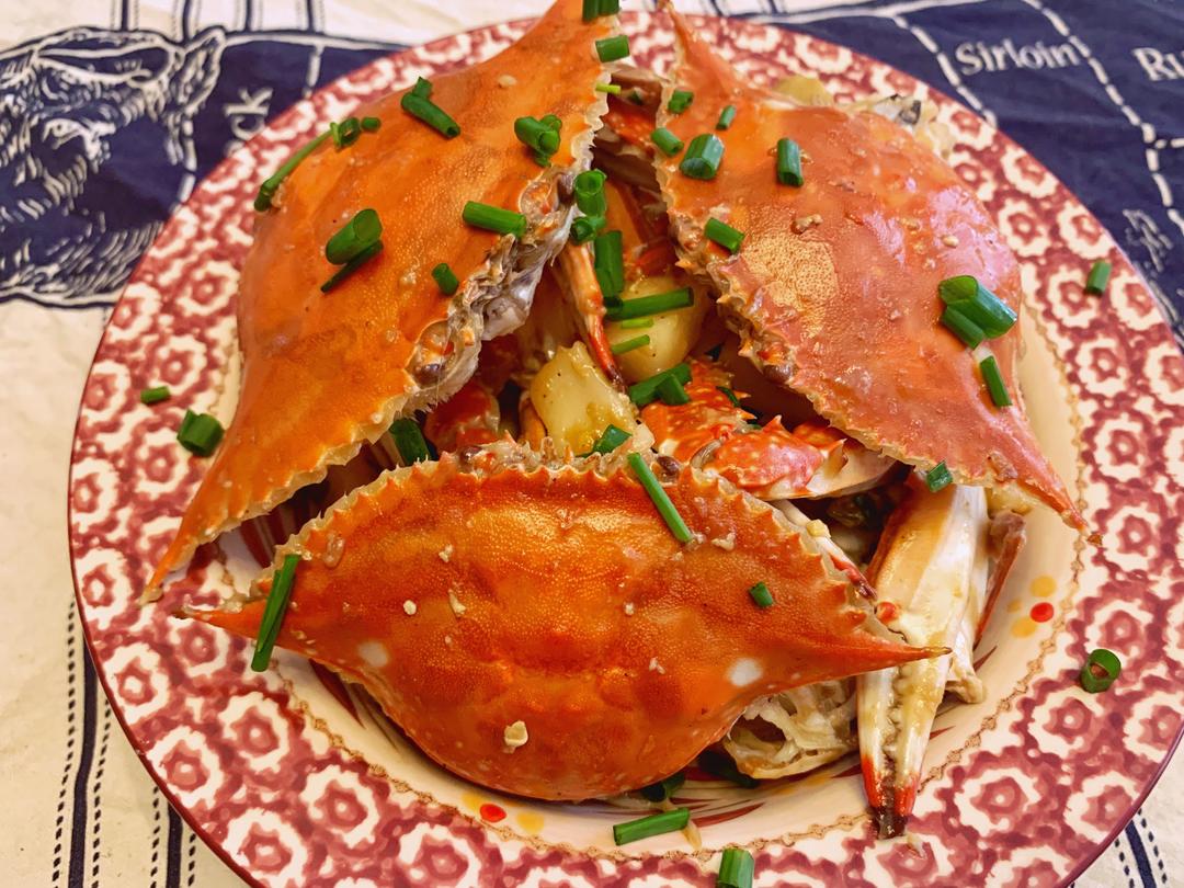 鲜掉眉毛的梭子蟹炒年糕的做法