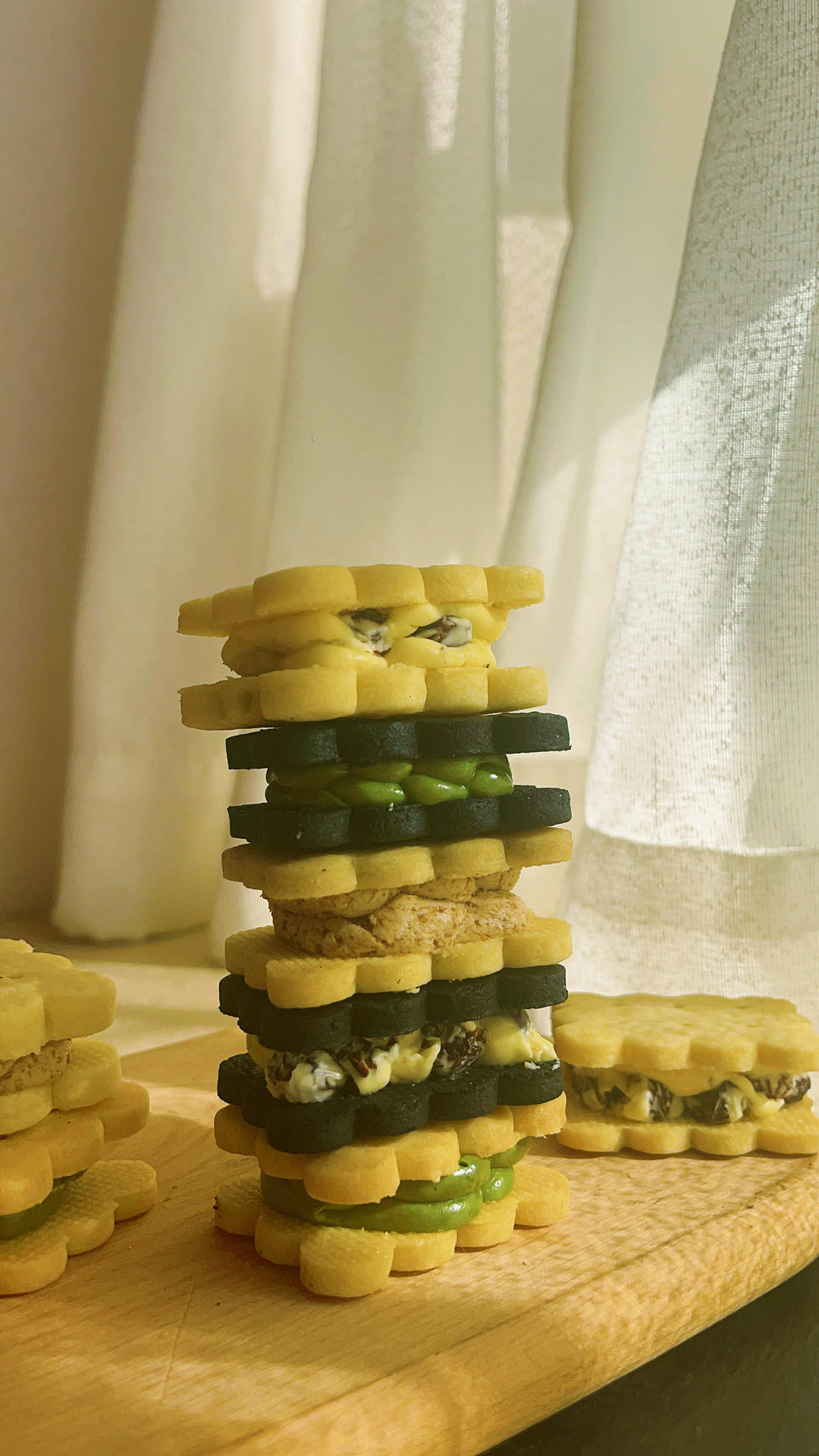 黄油三明治饼干（完美PK北海道六花亭朗姆葡萄三明治饼干）