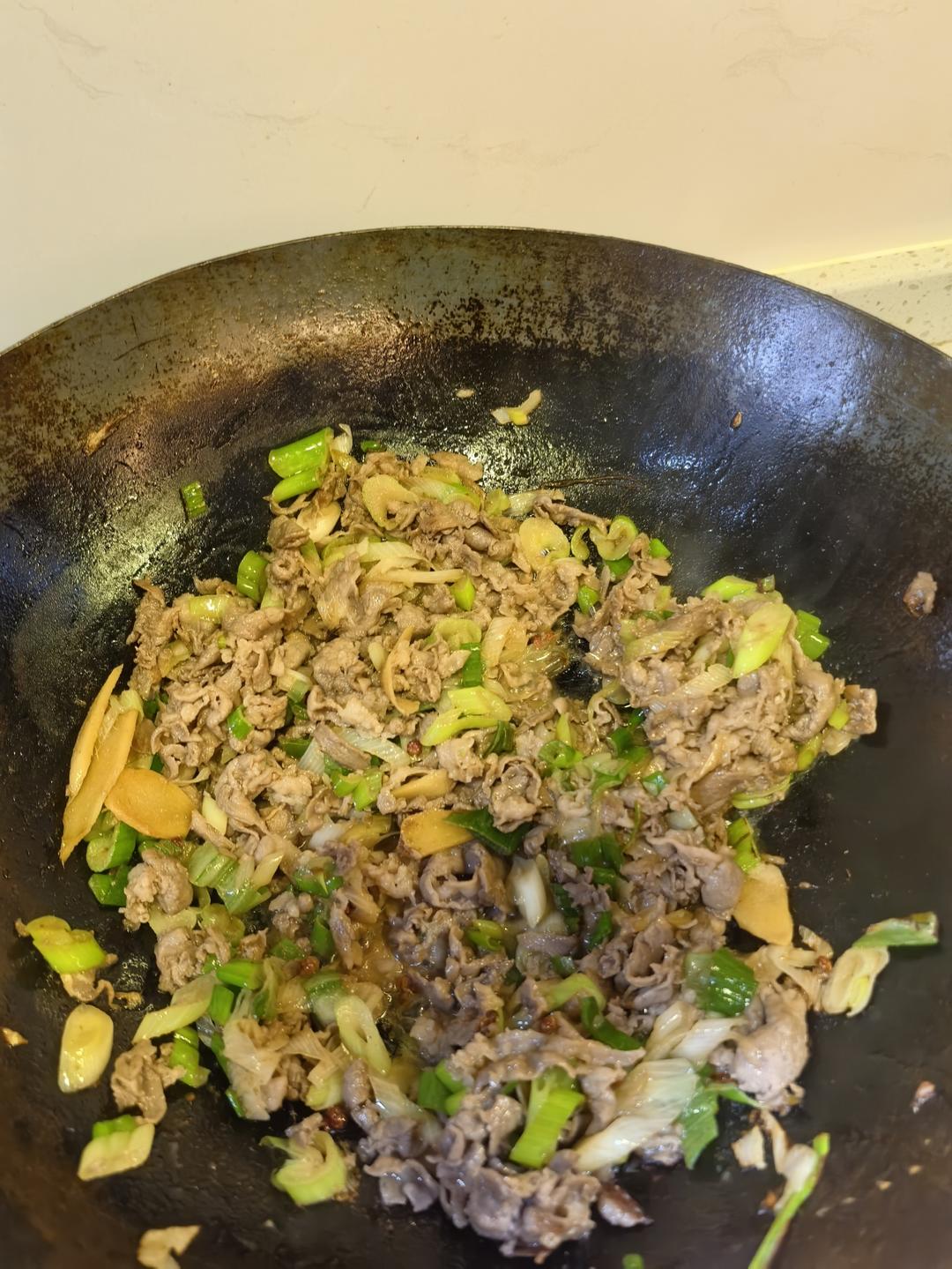 炒了20多年的葱爆羊肉